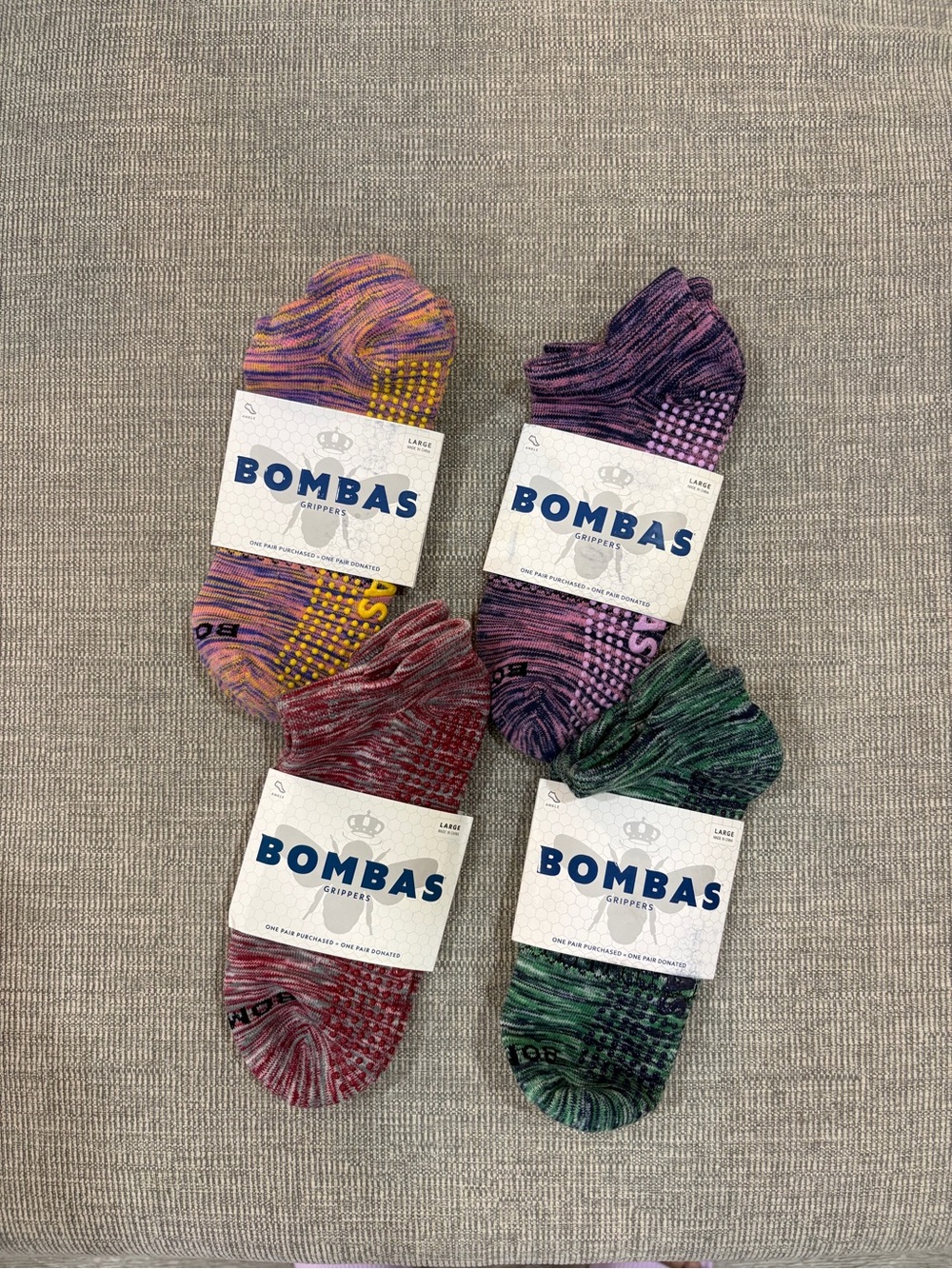 Bombas Men's No-Show Gripper Socks — Purple, Yellow/Orange, Red, Green (4 Pack)